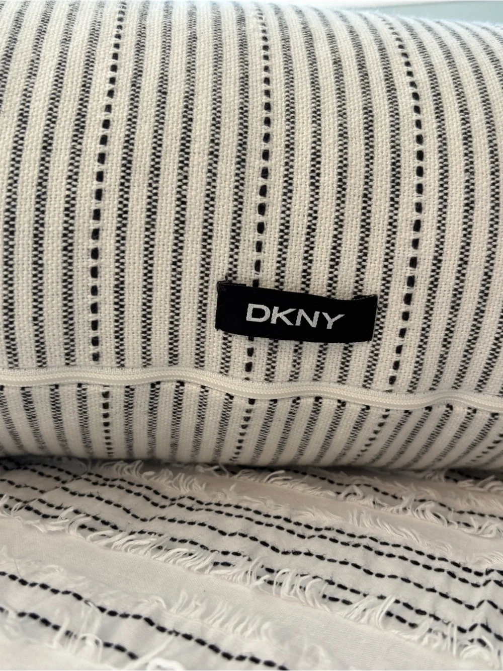 DKNY White Bedspread with Black Striped Bolster Pillows